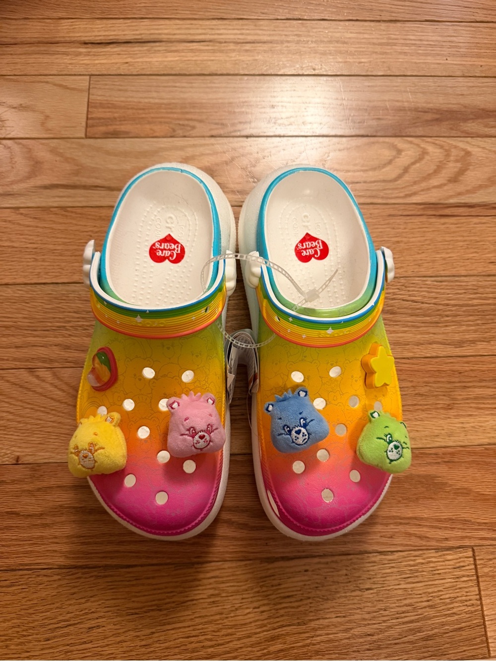 CROCS Rainbow Gradient Care Bears Clog - Yellow Pink Blue Green